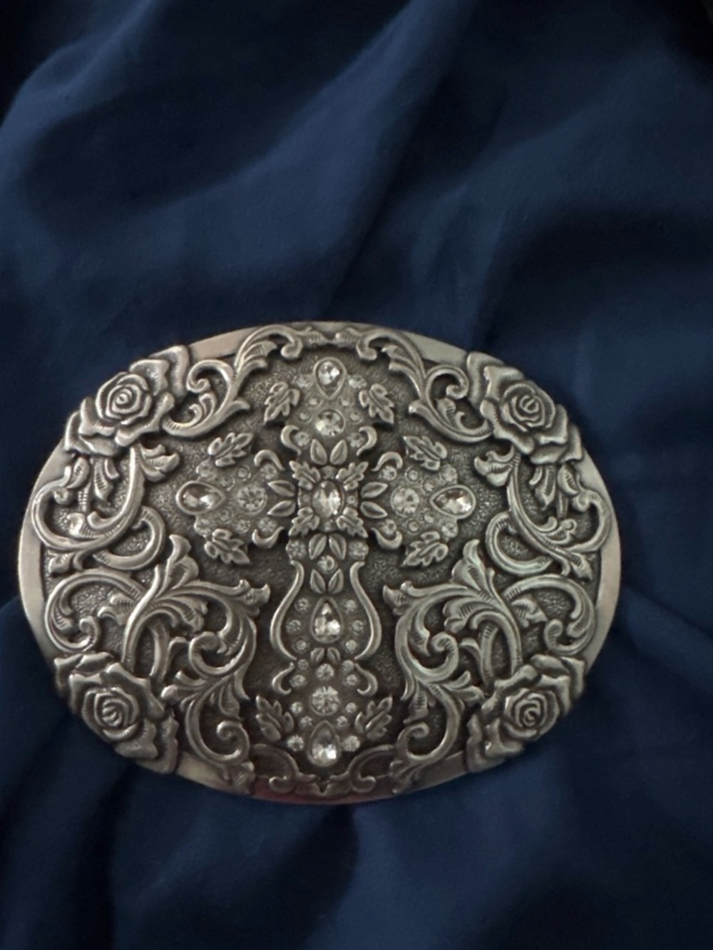 Nocona Silver ornate cross belt buckle with floral and scrollwork design